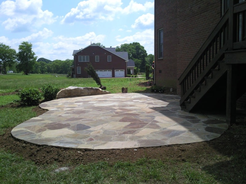 Oklahoma flagstone patio with boulder, Nashville, Brentwood, Franklin, Spring Hill, Nolensville, Arrington, and College Grove TN.