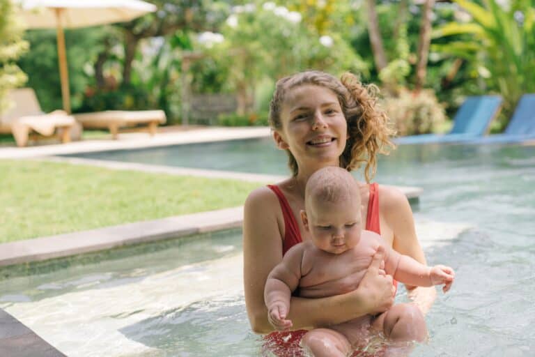 Mother and baby in a swimming pool having fun image Thompsons Station