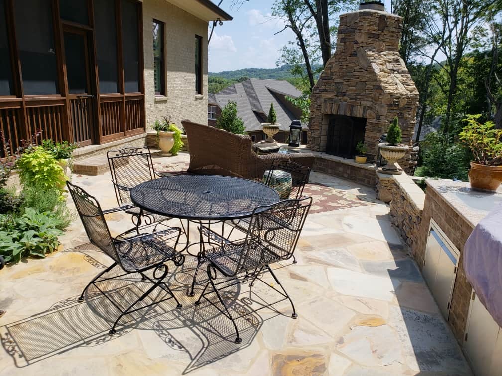 Stone fireplace , outdoor kitchen, and stone patio Belle Meade