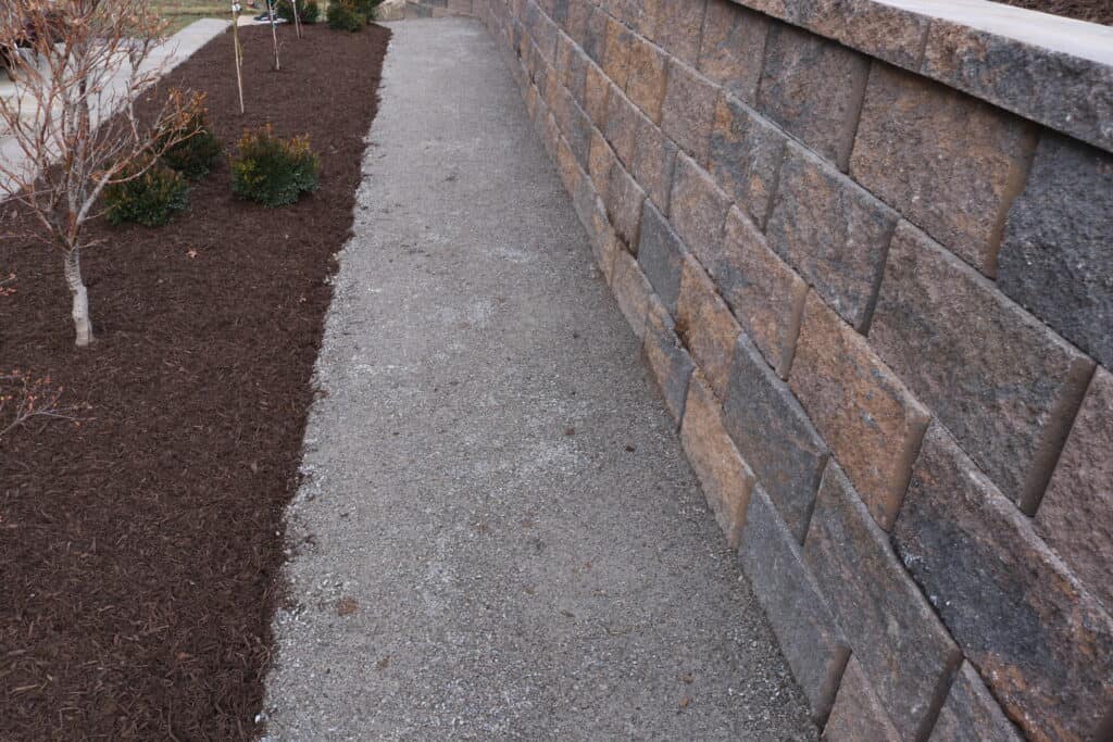 Retaining wall gravel path mulch spring hill