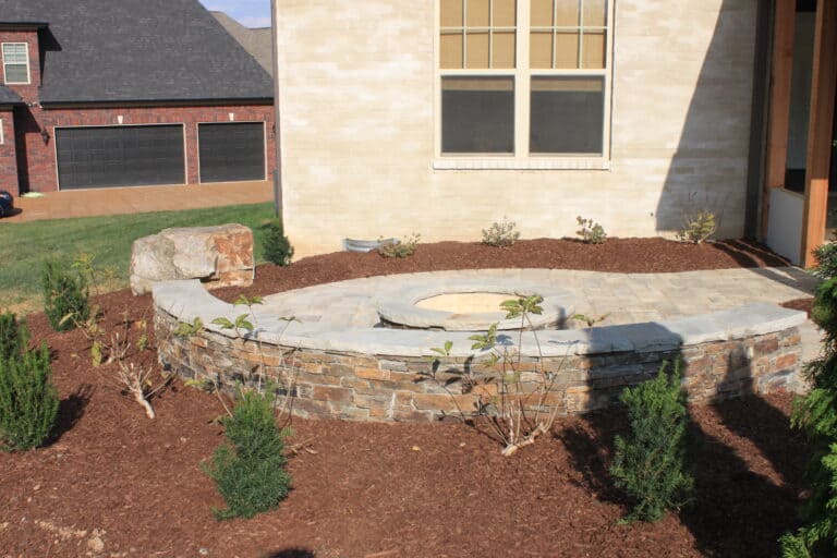 Round patio with firepit spring hill