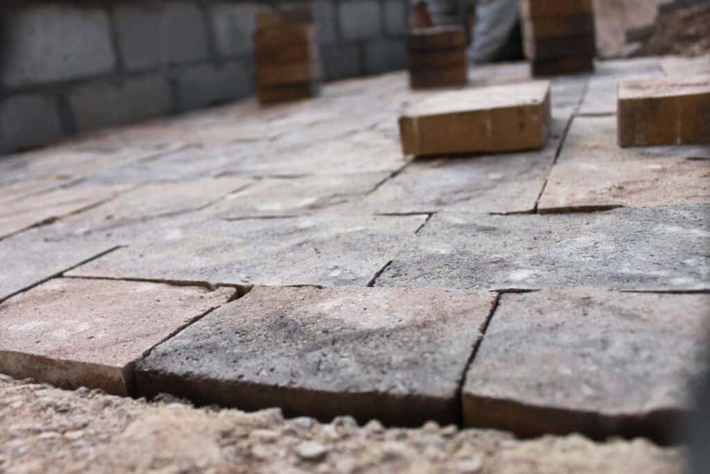 Three piece paver patio next to a concrete patio Spring Hill, Franklin, Brentwood, Nashville TN