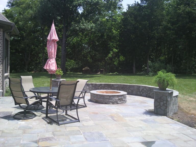 Pennsylvania Blue Flagstone patio with fire pit made with natural stone Arrington