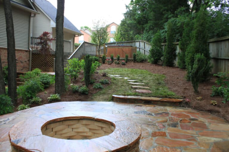 Fire pit and patio natural stone backyard landscaping