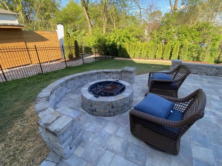 Paver patio with seat wall and firepit Spring Hill